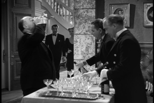 Alfred Hitchcock Presents: Gulping Champagne at the Bar